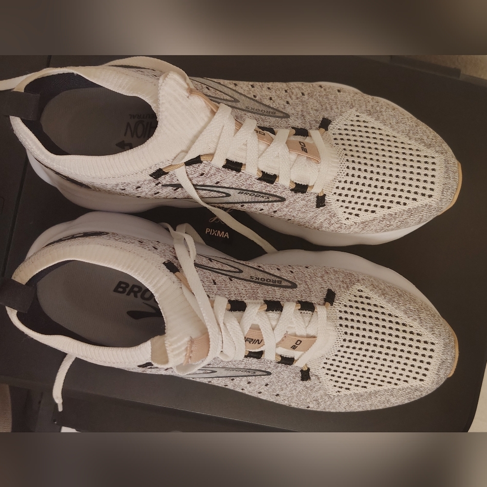 NEW Brooks White and Black Running Shoes size 9. No tag. No box. NEW.